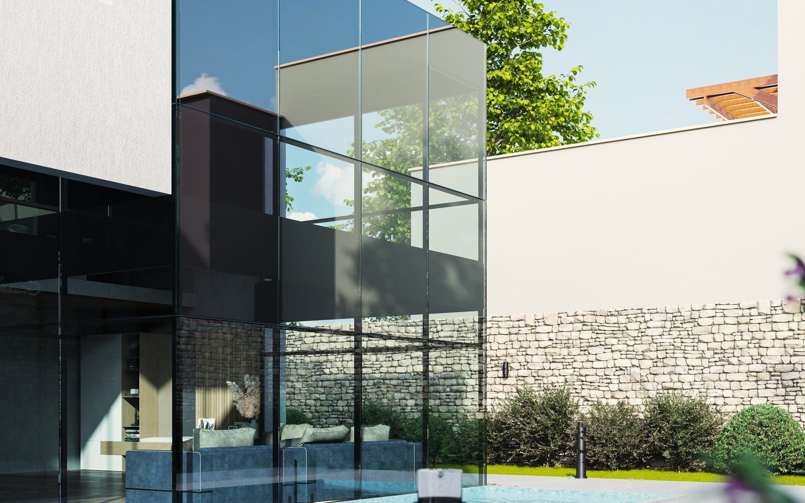 Large-format glass corner facade of a modern villa at dusk