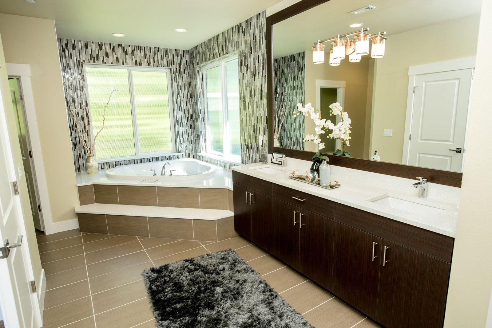 beige sintered stone slab bathroom with built-in bathtub