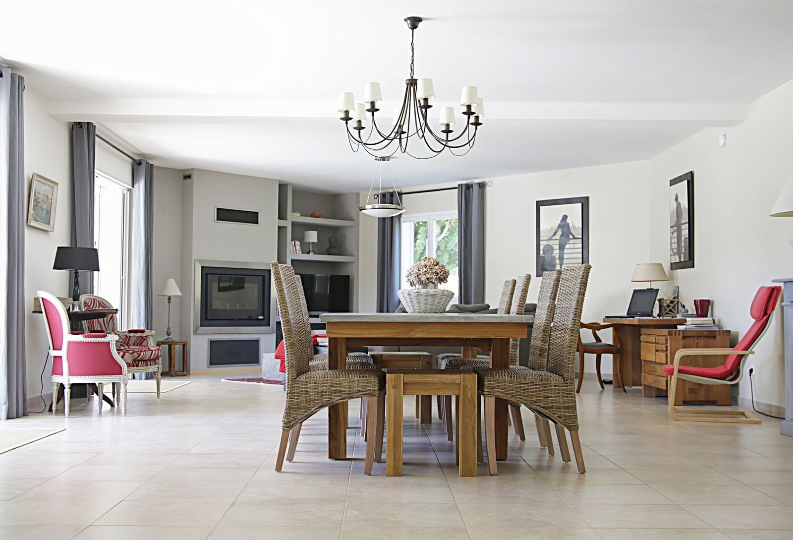 cream large-format porcelain floor in a bright villa dining room