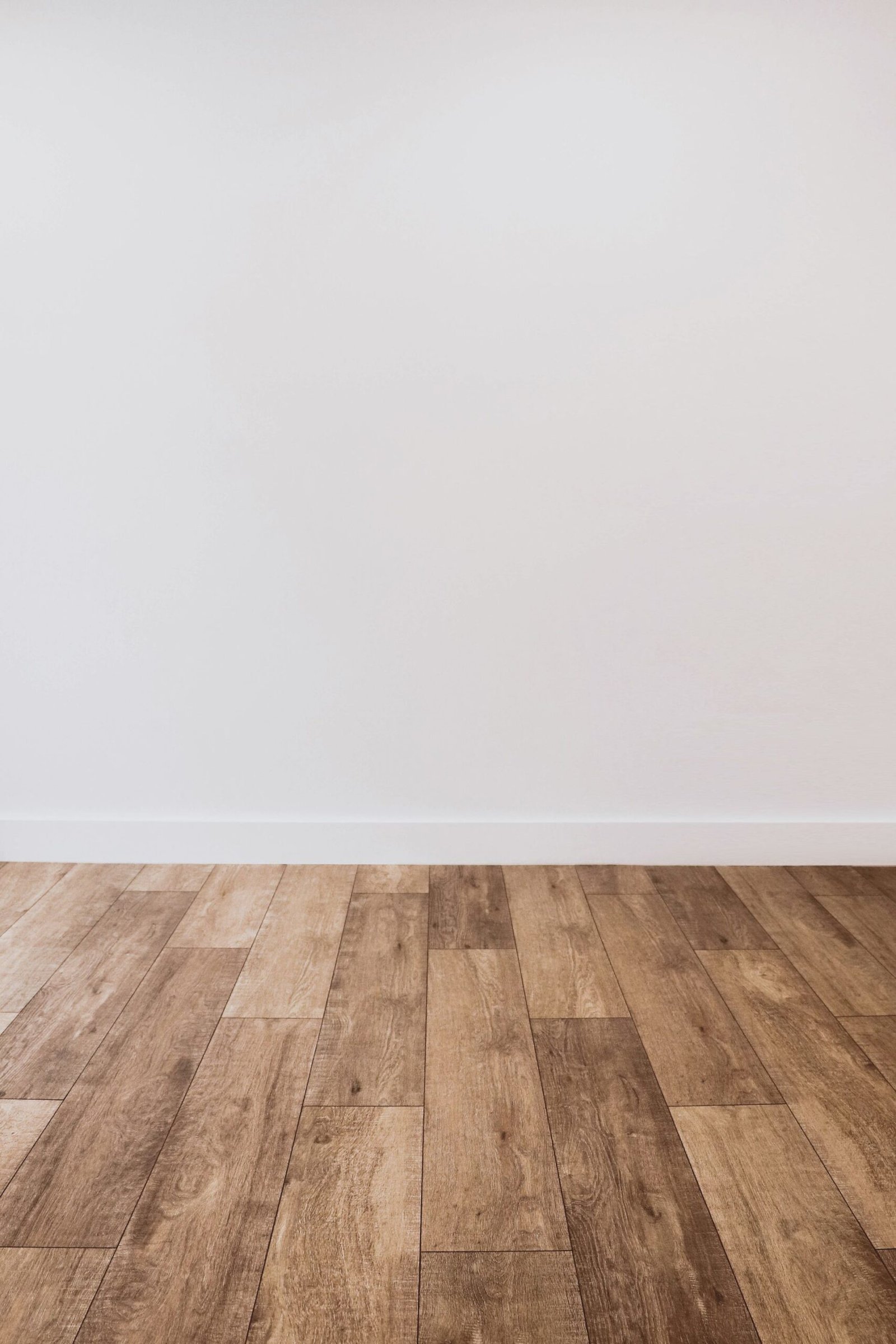 oak engineered plank detail against a painted villa wall