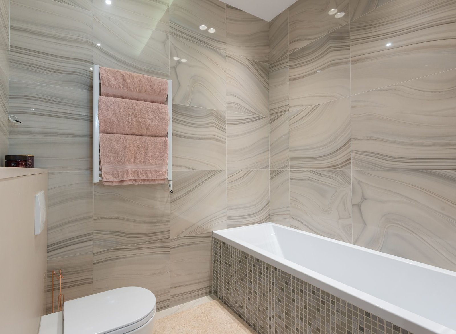 Marble-tiled villa bathroom with freestanding bath