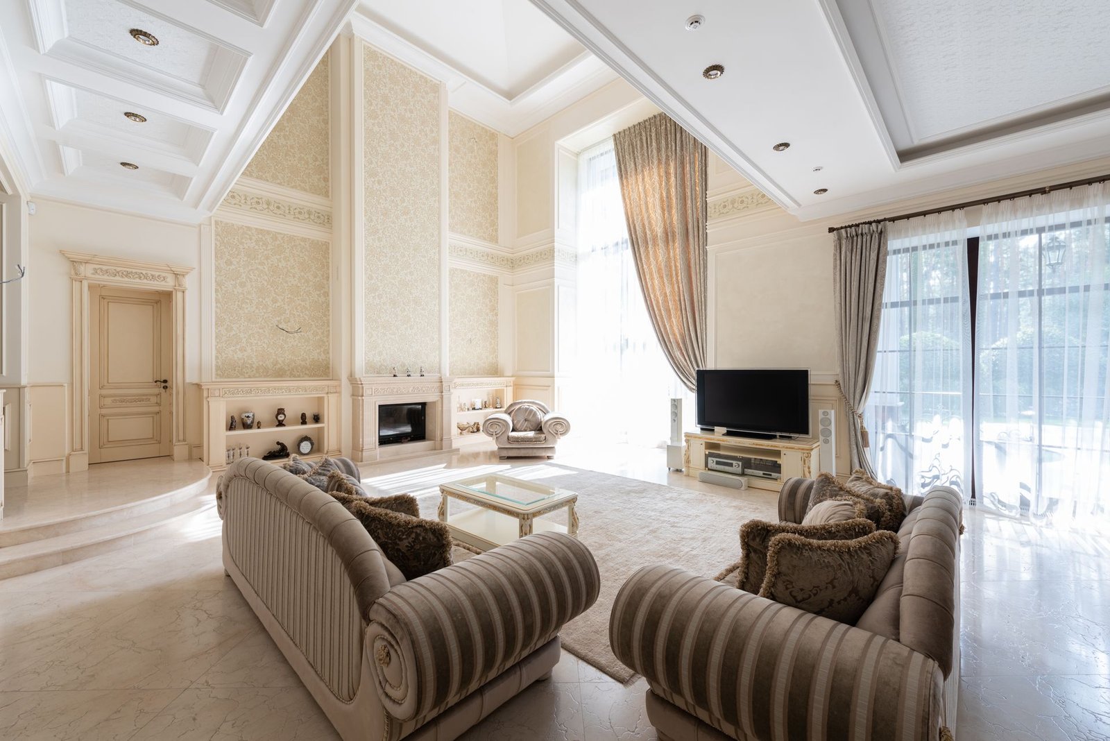 Rolled-arm sofas in a luxury classic living room