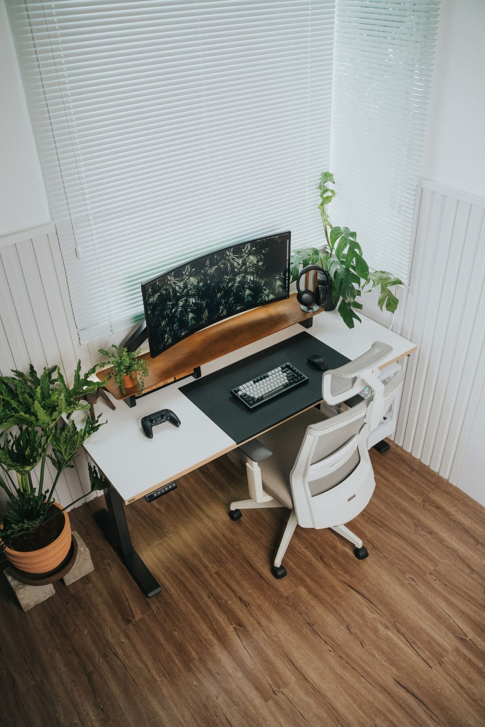 White desk with task chair on a timber floor