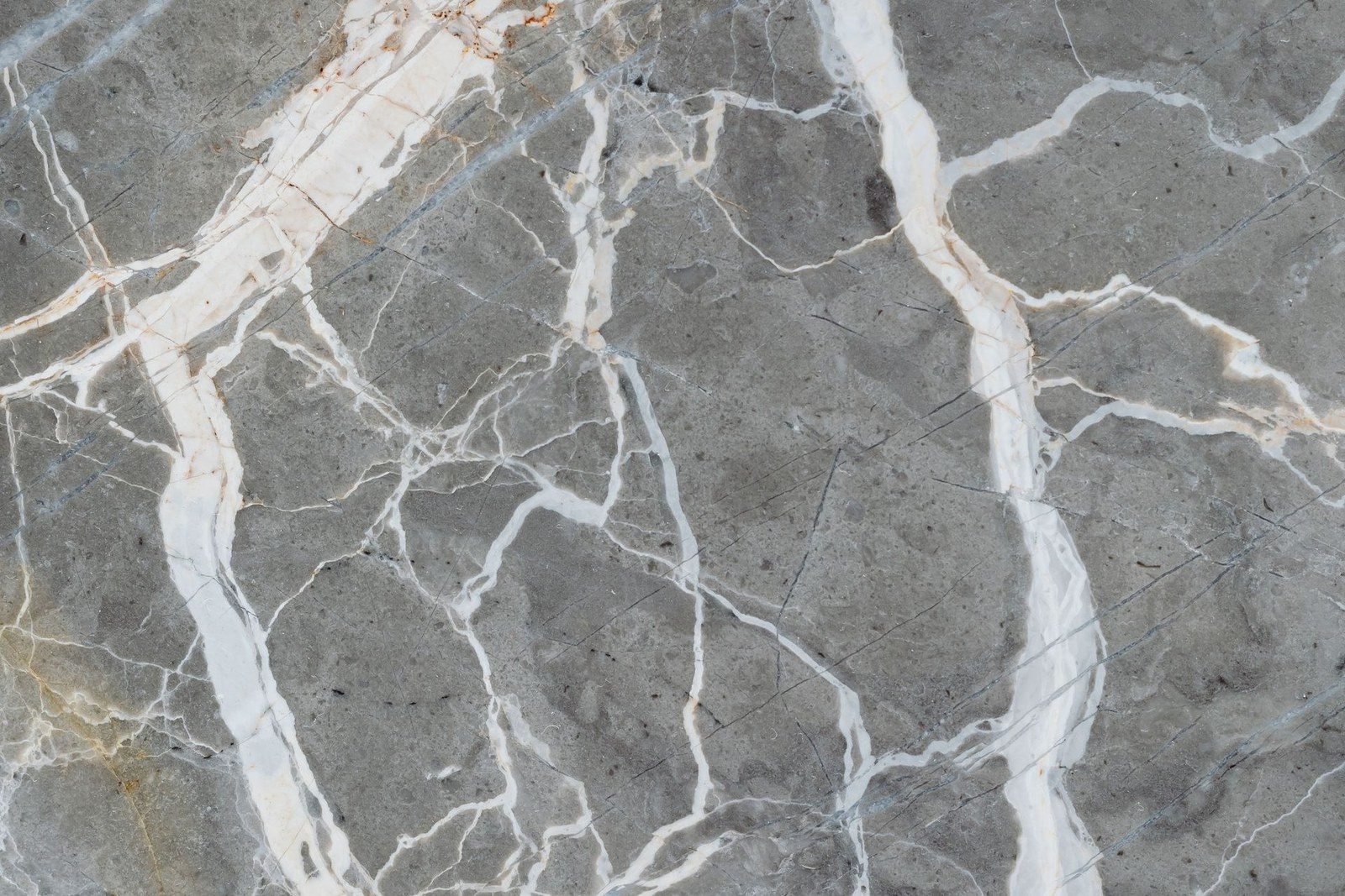 Grey sintered slab with white veining, close-up