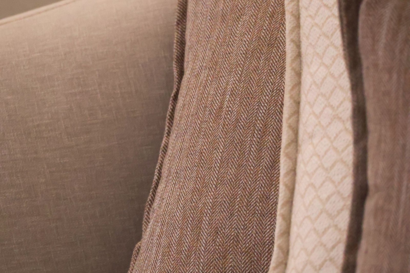 Textured linen cushions in a warm palette