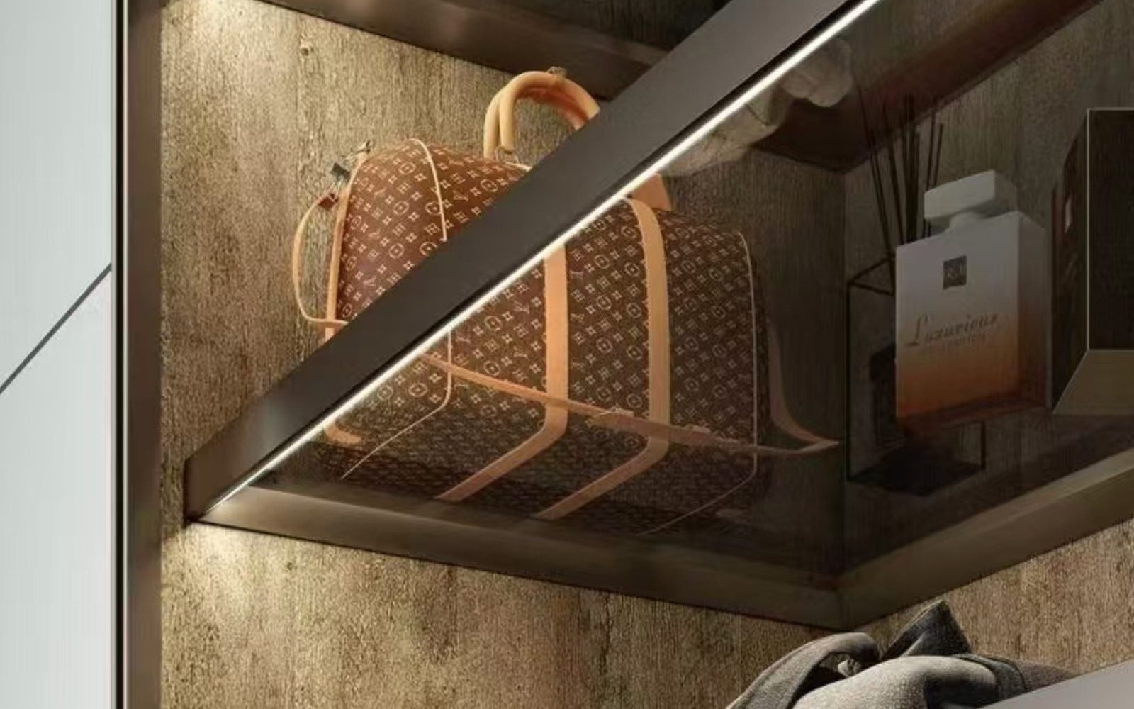 Illuminated glass shelf inside a wardrobe lit by an integrated LED strip
