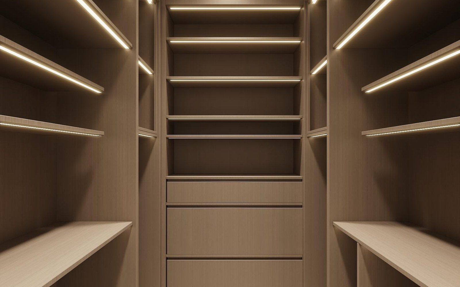 Walk-in pantry aisle with open shelving and a central drawer bank under warm strip lighting