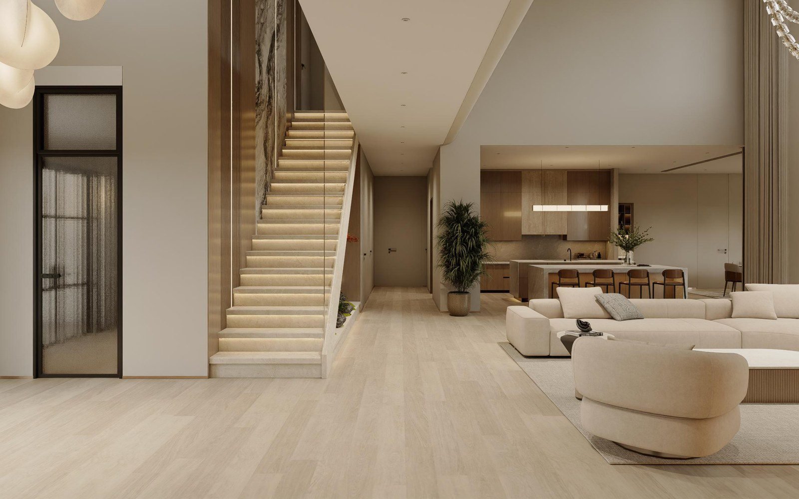 Straight-run stone staircase with under-tread lighting and a glass railing in a double-height villa great room