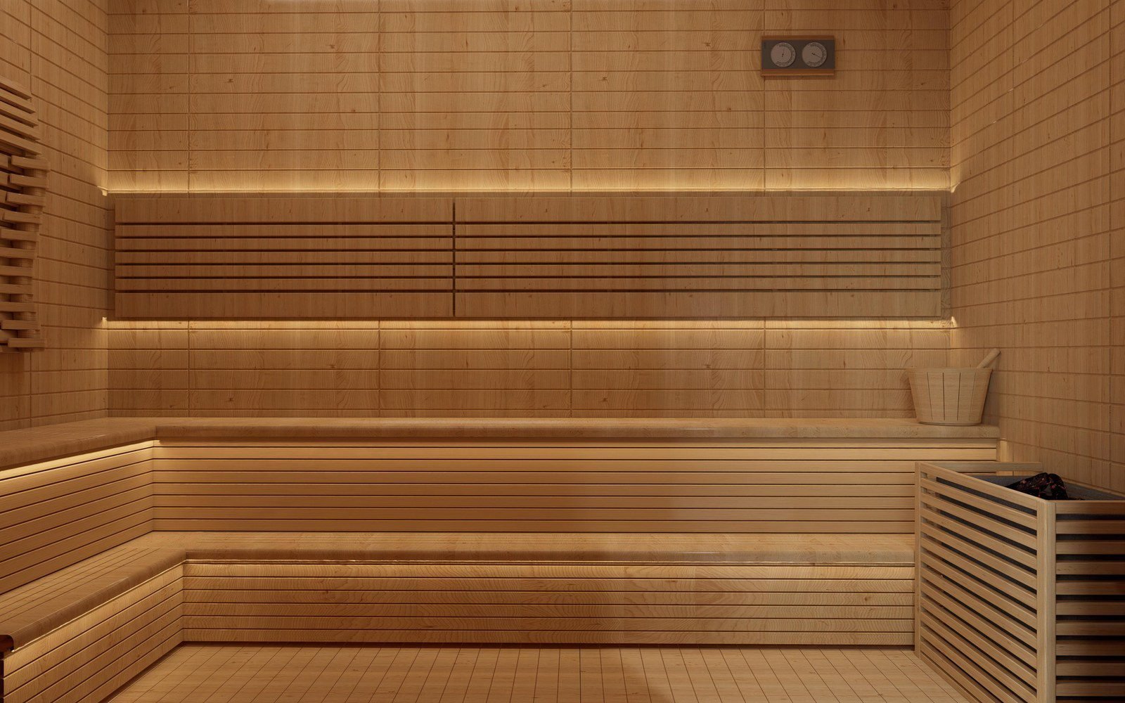 Wood paneled villa sauna room with L shaped slatted bench, lidded bucket and backlit slat wall