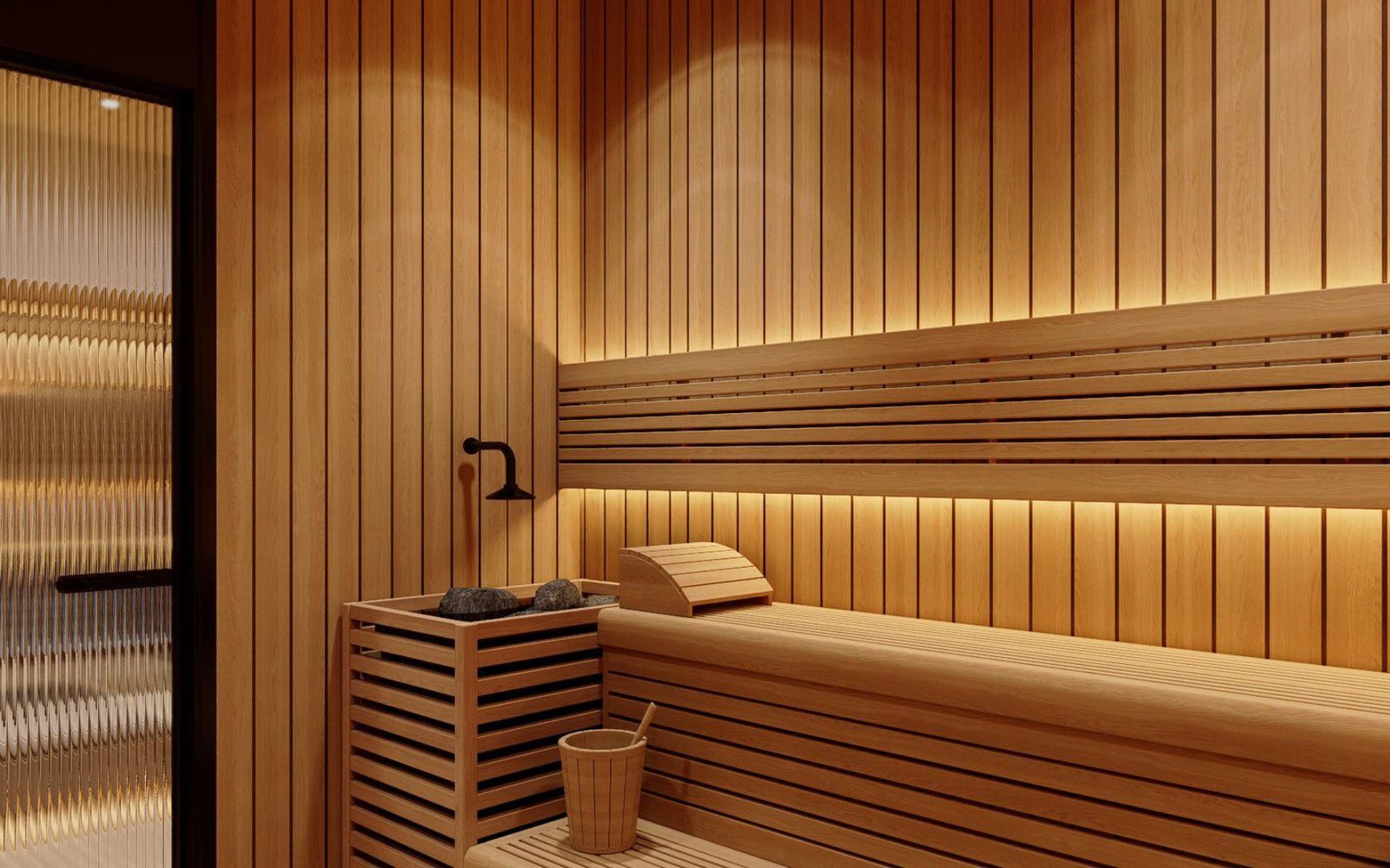 Sauna room with slat bench, stone heater and glass door in a villa wet room