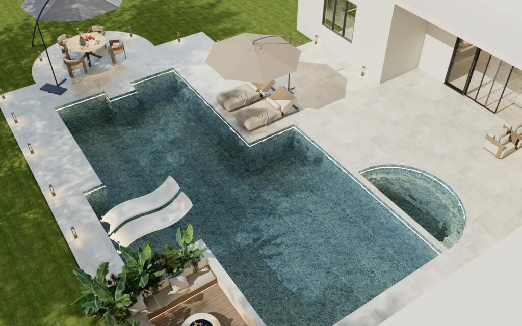 Villa pool with its spa corner from above; the outdoor class of cold plunge tub joins this family of water features on the same plan