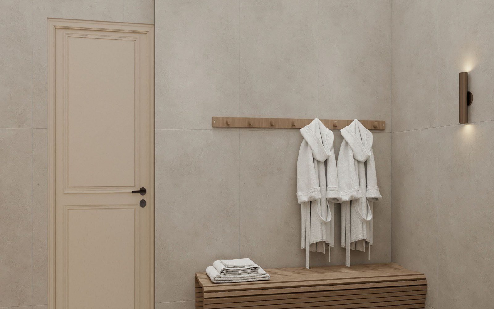 The dry-off end of the pairing; robes and towels at the spa door the plunge room opens to